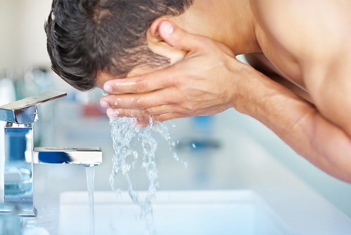 Man washing face