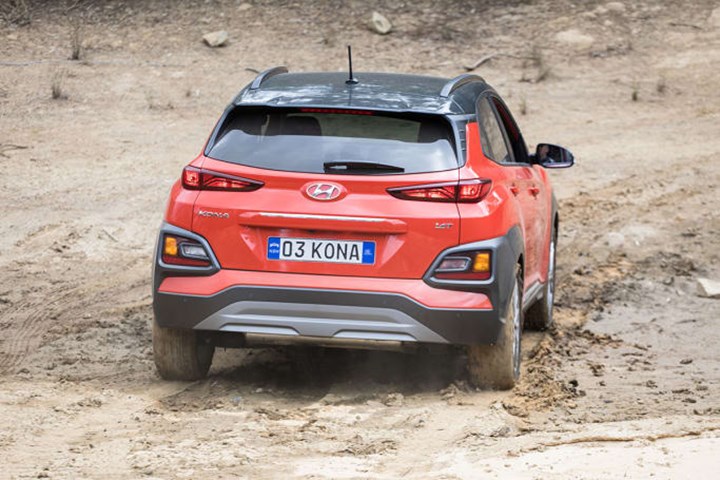 back of car in mud