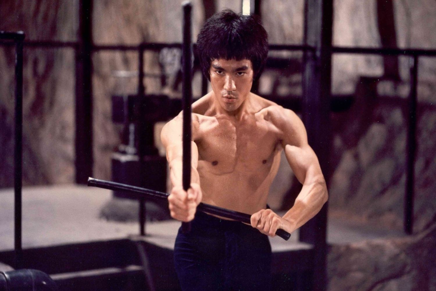 Did Bruce Lee Die From Drinking Too Much Water? Researchers Think So -  Men's Health Magazine Australia